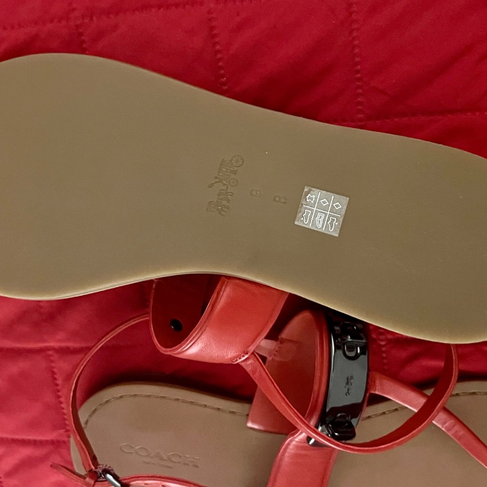 Coach Gracie Swagger Orange-Rust Orange Turn Lock Leather T Strap Sandals. - Picture 10 of 14